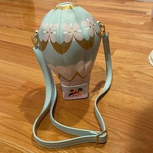 Disney “It’s A Small World” crossbody bag